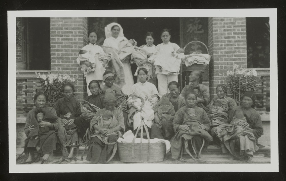 Nurses With Villagers &amp; Babies.