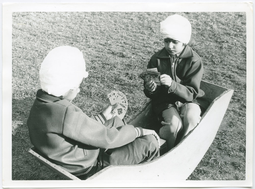 Jaswinder and Ajaib playing cards