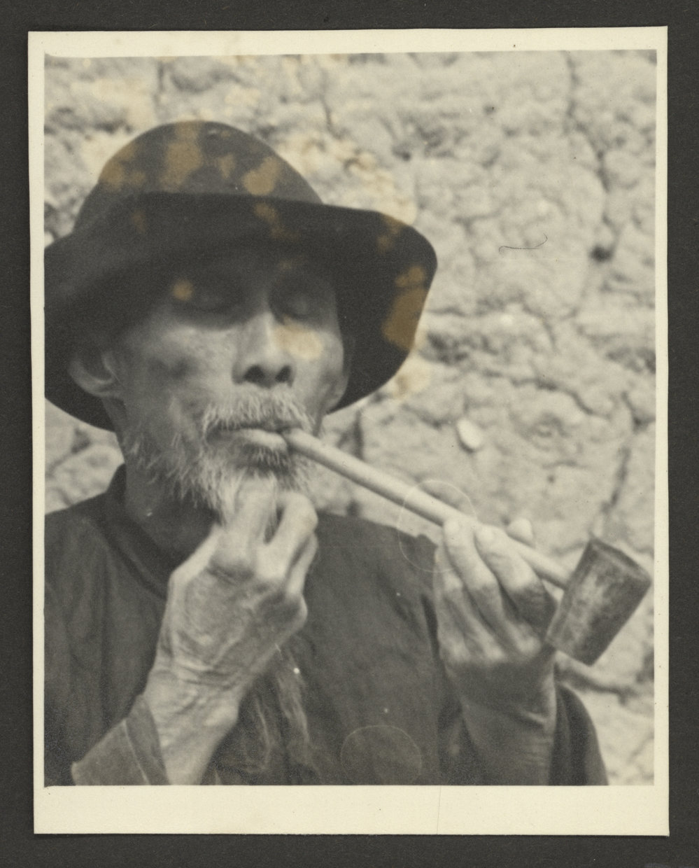 Elderly Man With Pipe