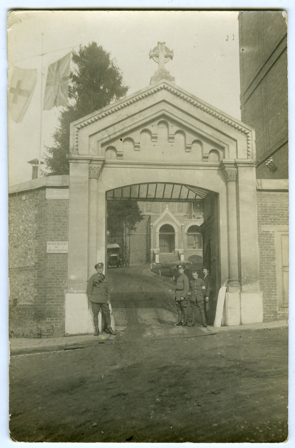 Soldier outside a gate 