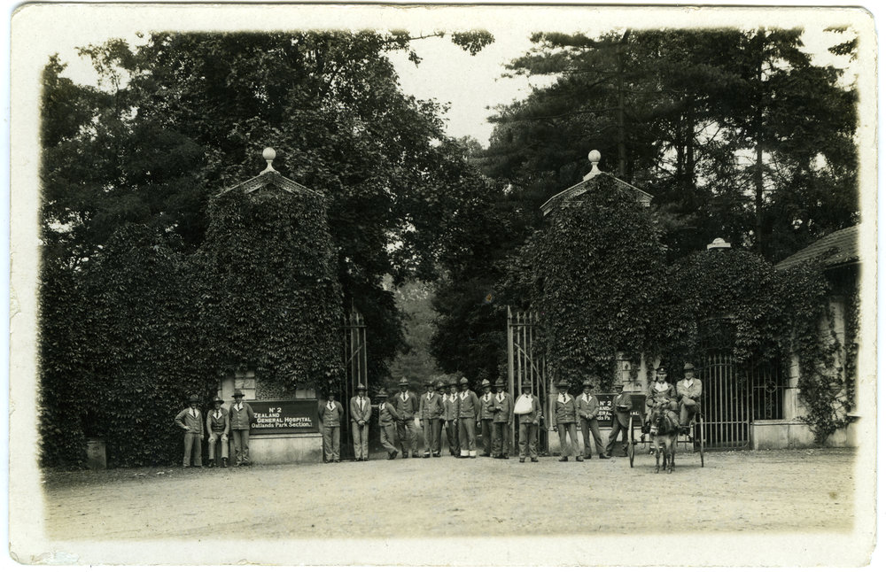Main gates Oatlands Park, with patients standing at gate