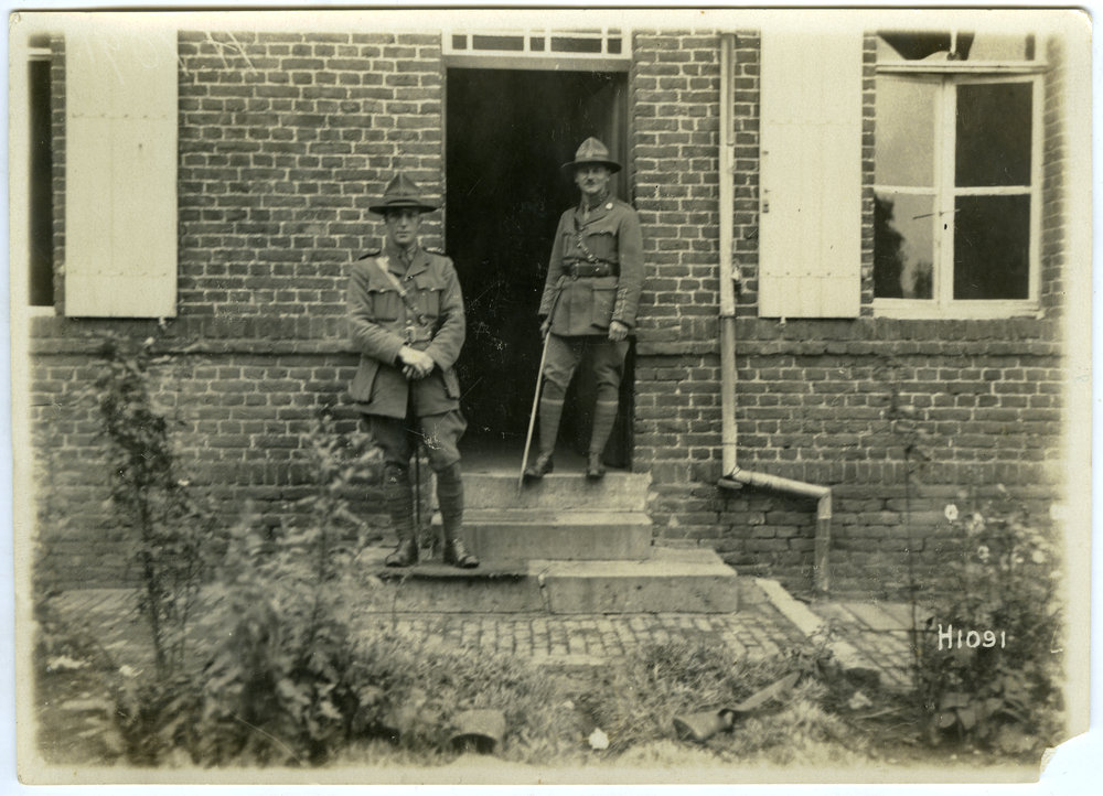 E. J. Tipler and another Chaplain, on steps
