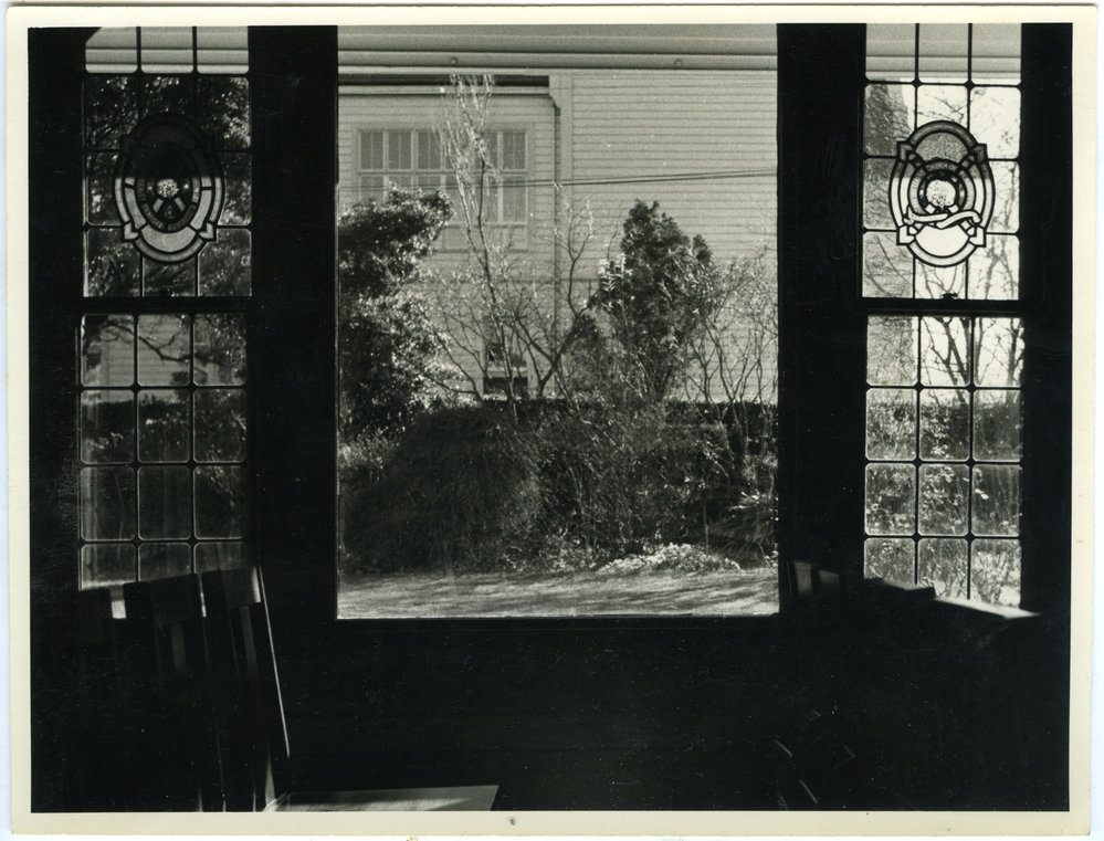 Looking through a window at the Deaconesses College