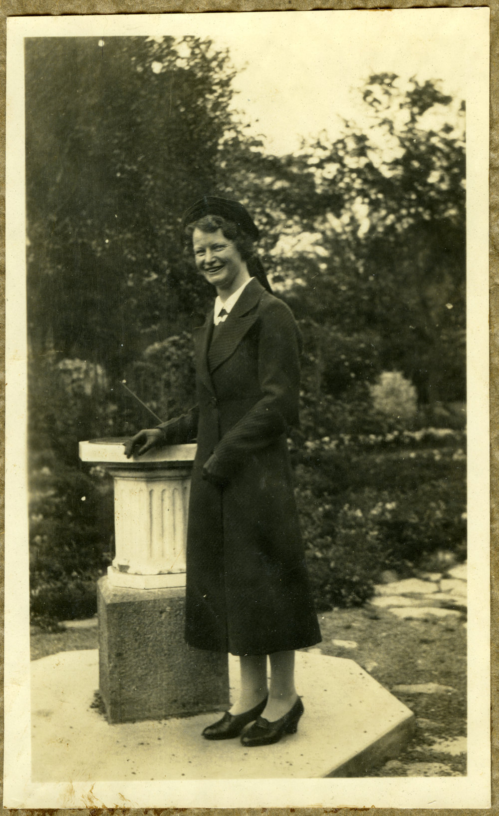 Miss Cathie G. Weir in a garden 