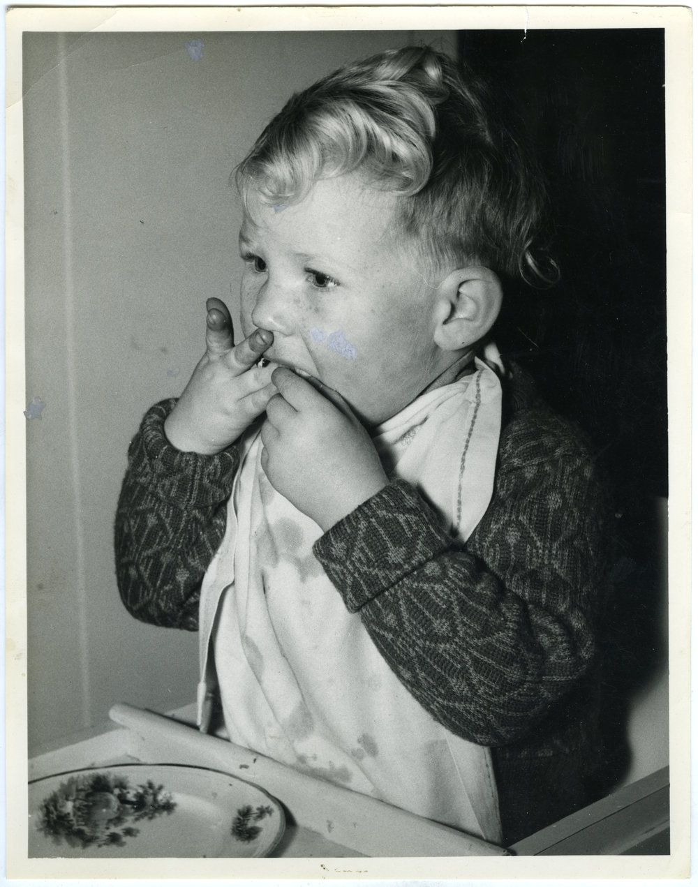 Unknown boy eating at Marama Children's Home, Glendining Home, 1955