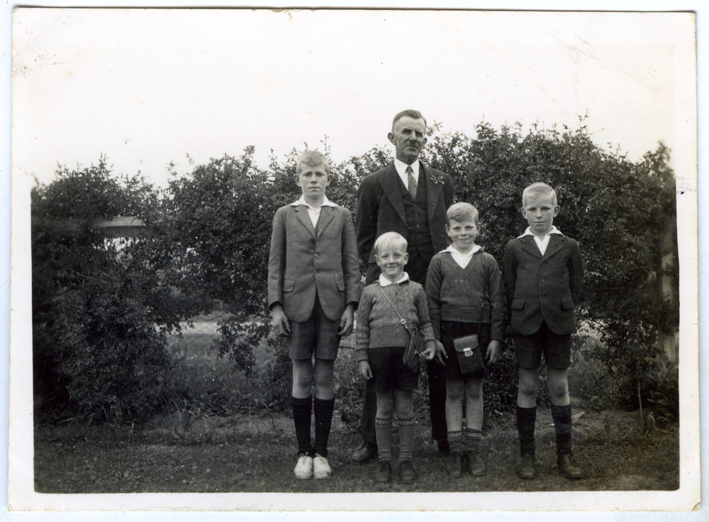 Unidentified man and his four sons
