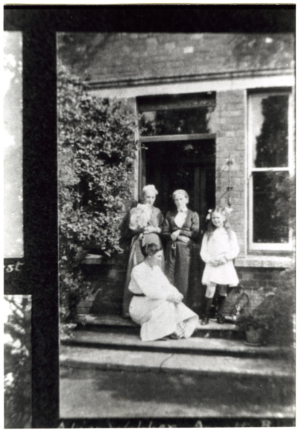Family portrait taken on the doorstep, 1912