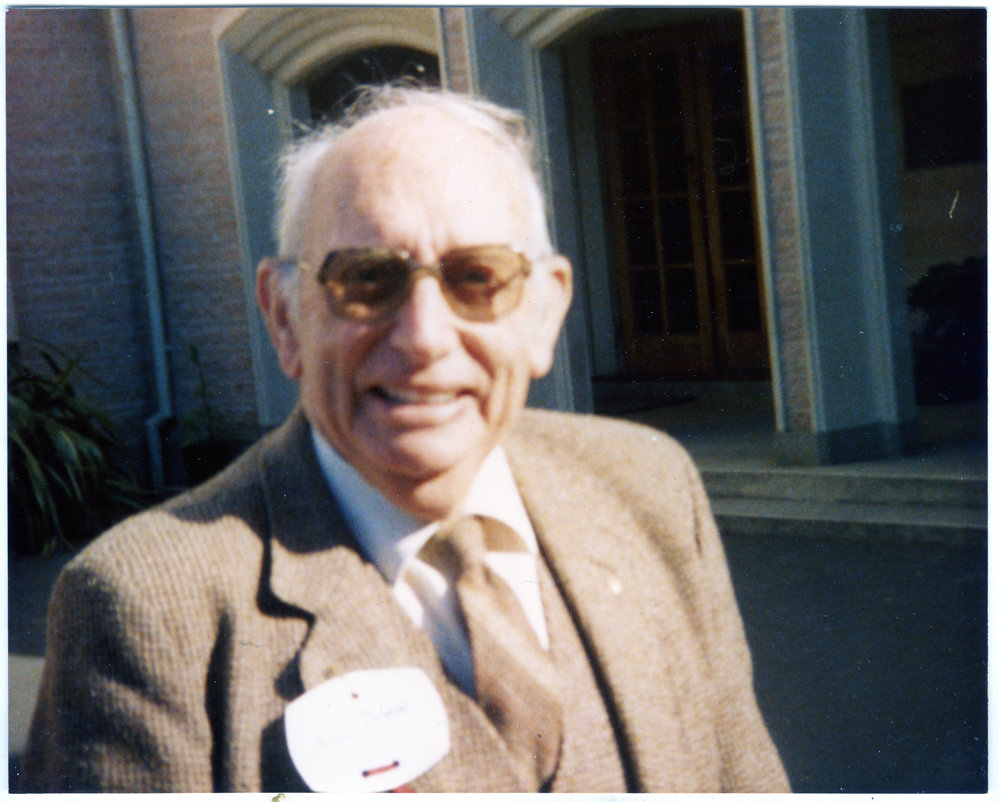 Unidentified man wearing glasses