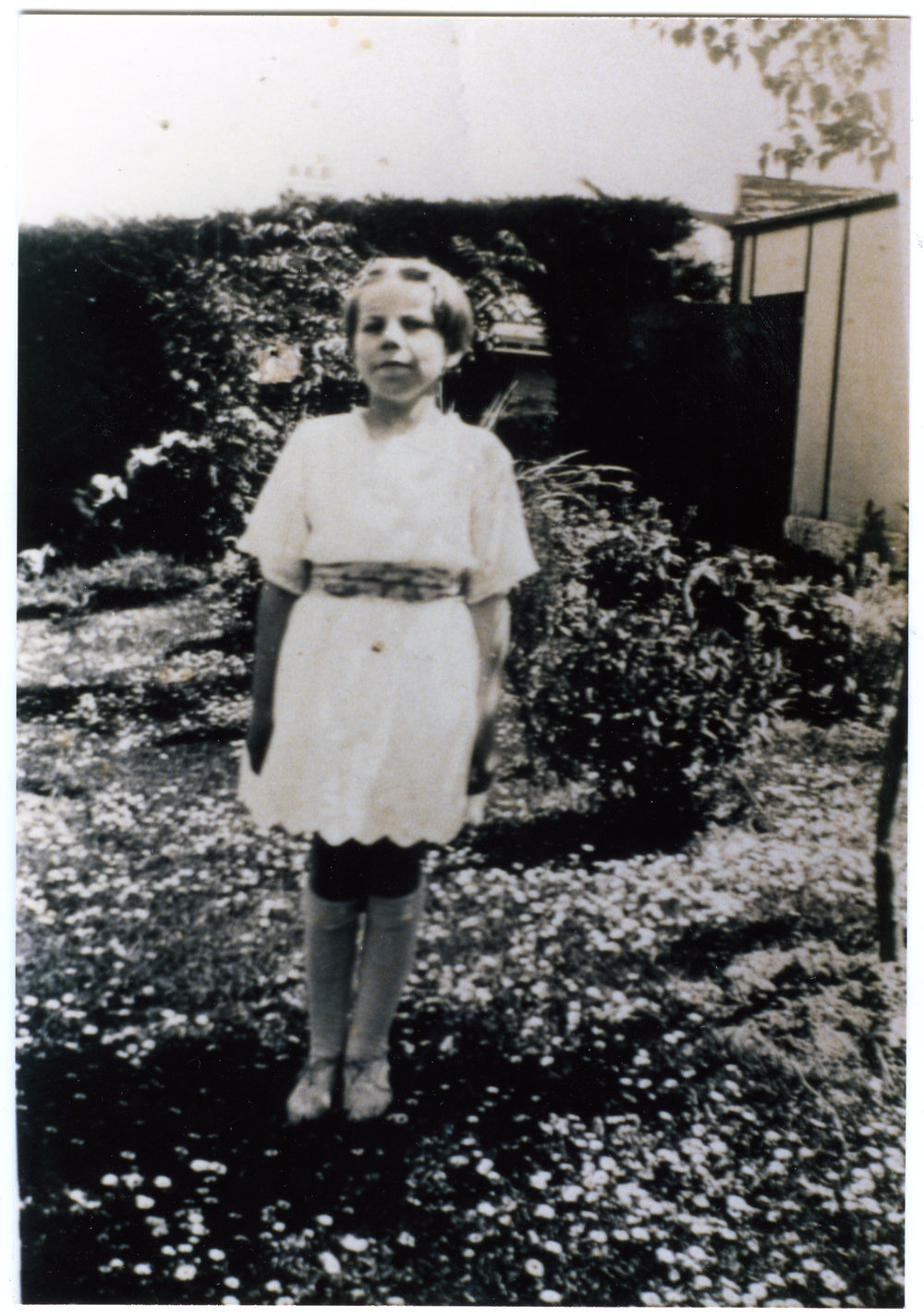 Unidentified girl in a white dress
