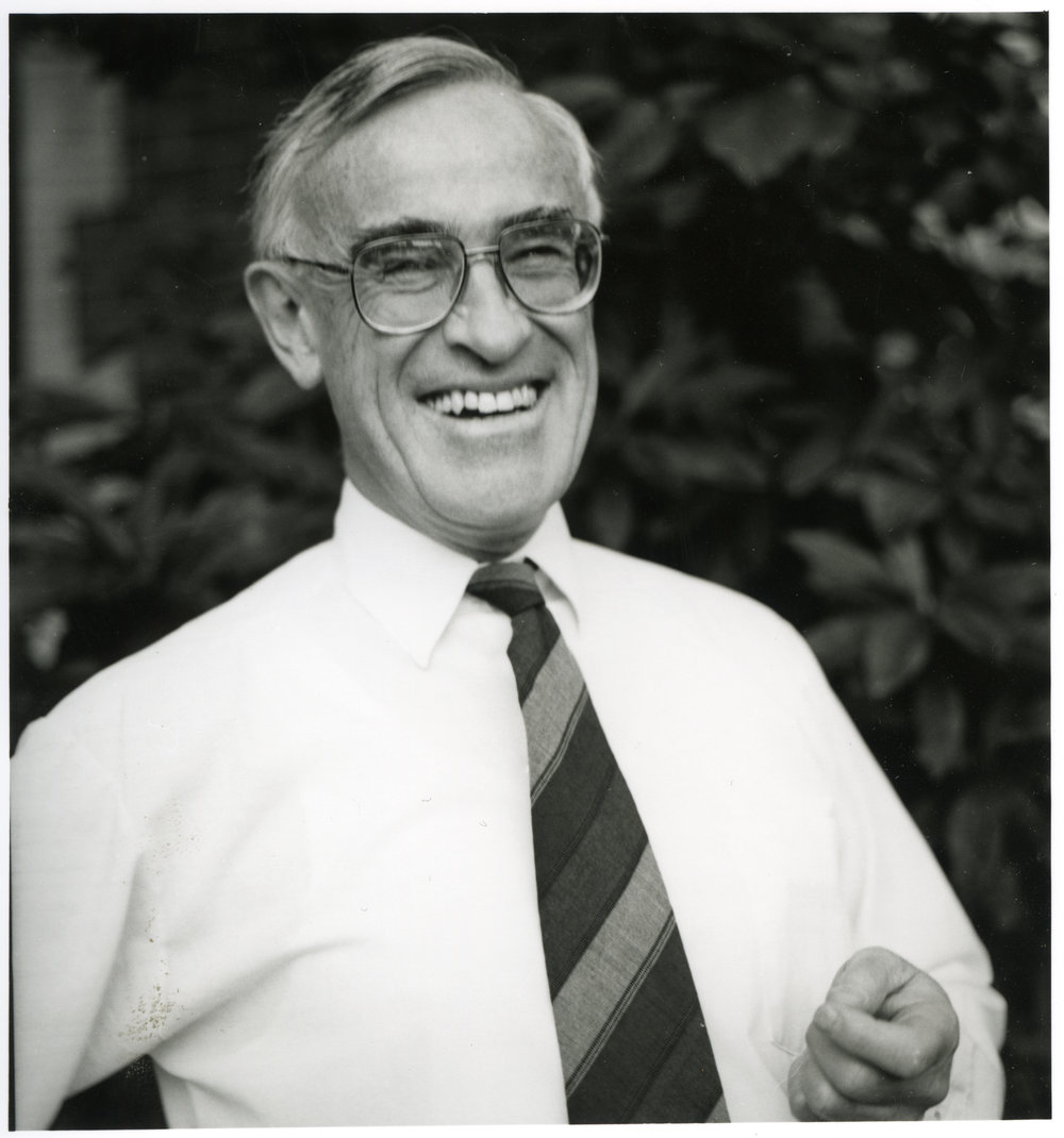 Reverend Doctor Simon H. Rae, laughing