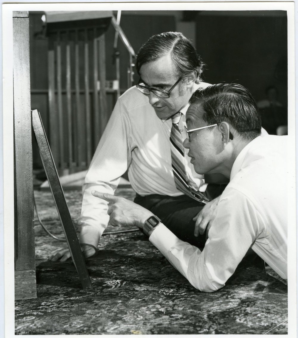 Reverend Simon Rae and Ping Nah Ng, studying