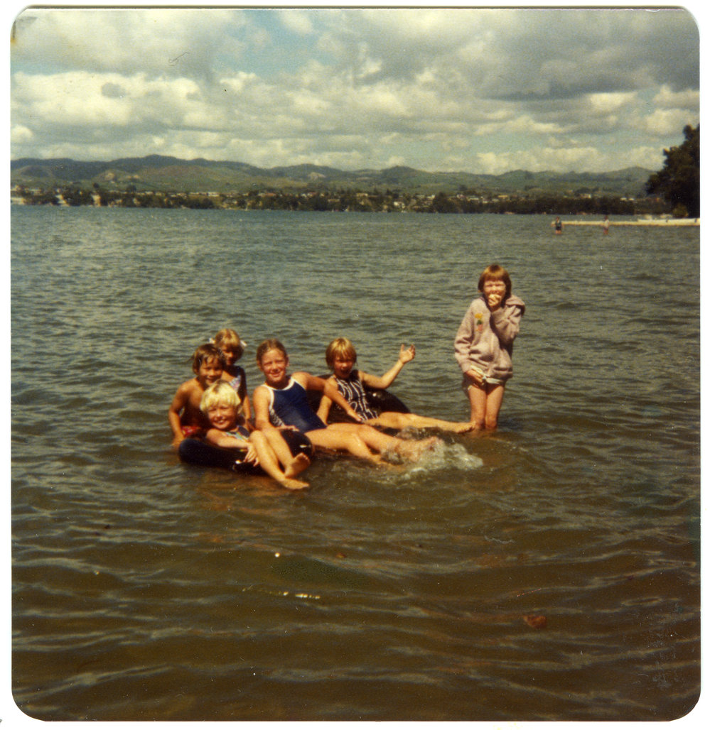 Children playing in water at the St. Enoch's Church picnic, 1980