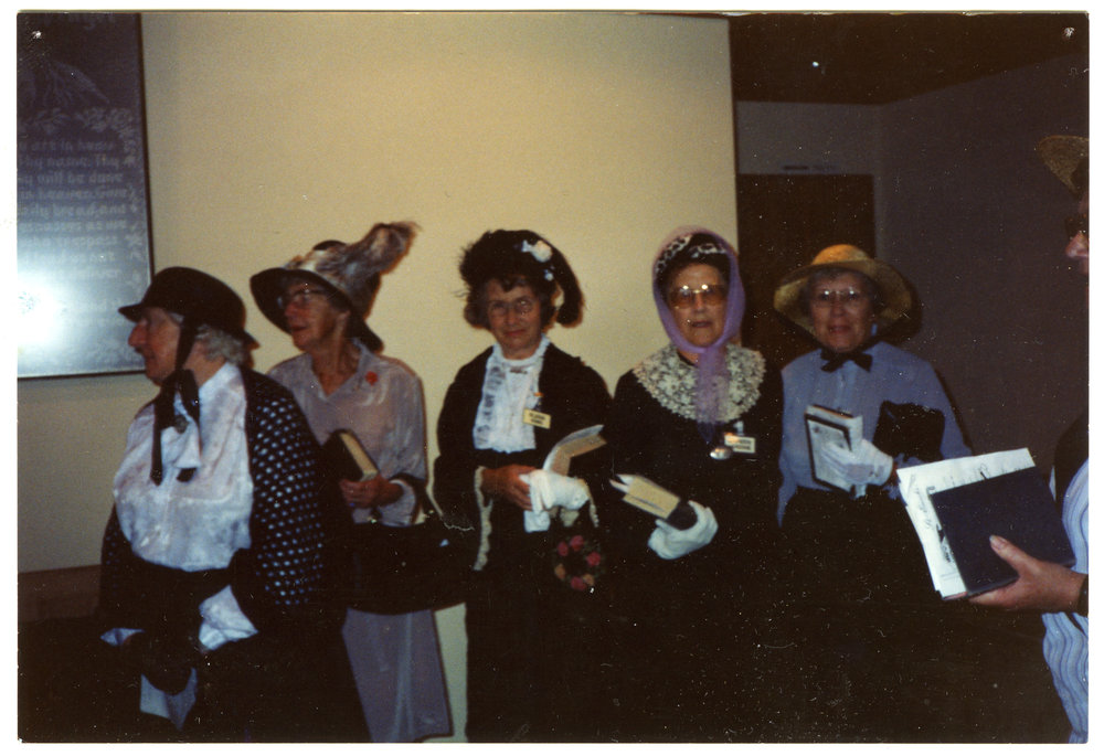 "Entering into the spirit of things," group portrait