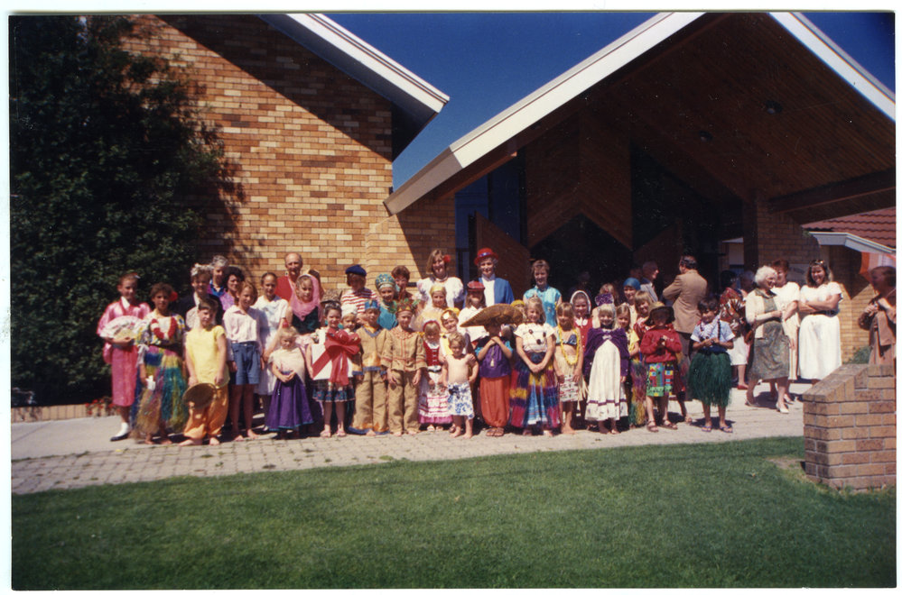 Group of children standing outside St. Enoch's Church 