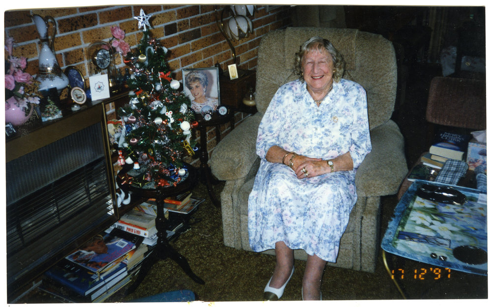 Ngaire Barton, listening to Christmas carols by Sunday School children, 1997