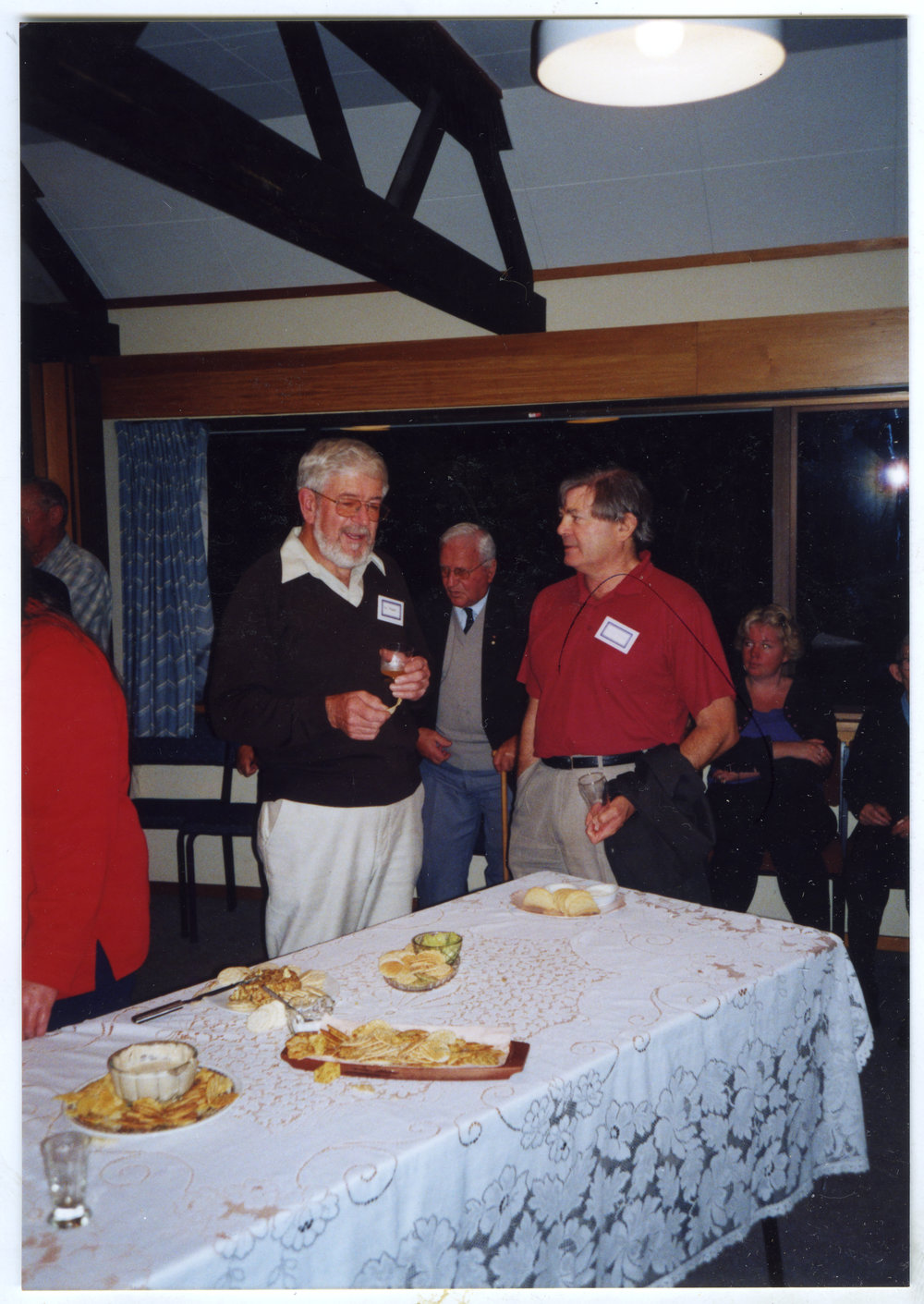 Kevin Patmore speaking to Ron Maunder, Harry bush in background, St. Enoch's Church