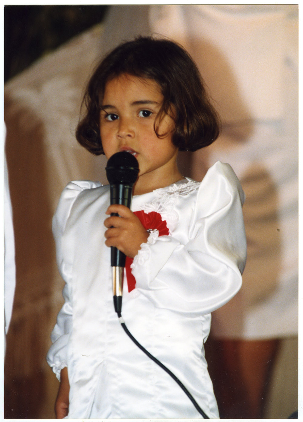 A young girl singing at Glen Eden Pacific Islanders Church during a White Sunday service, 2002