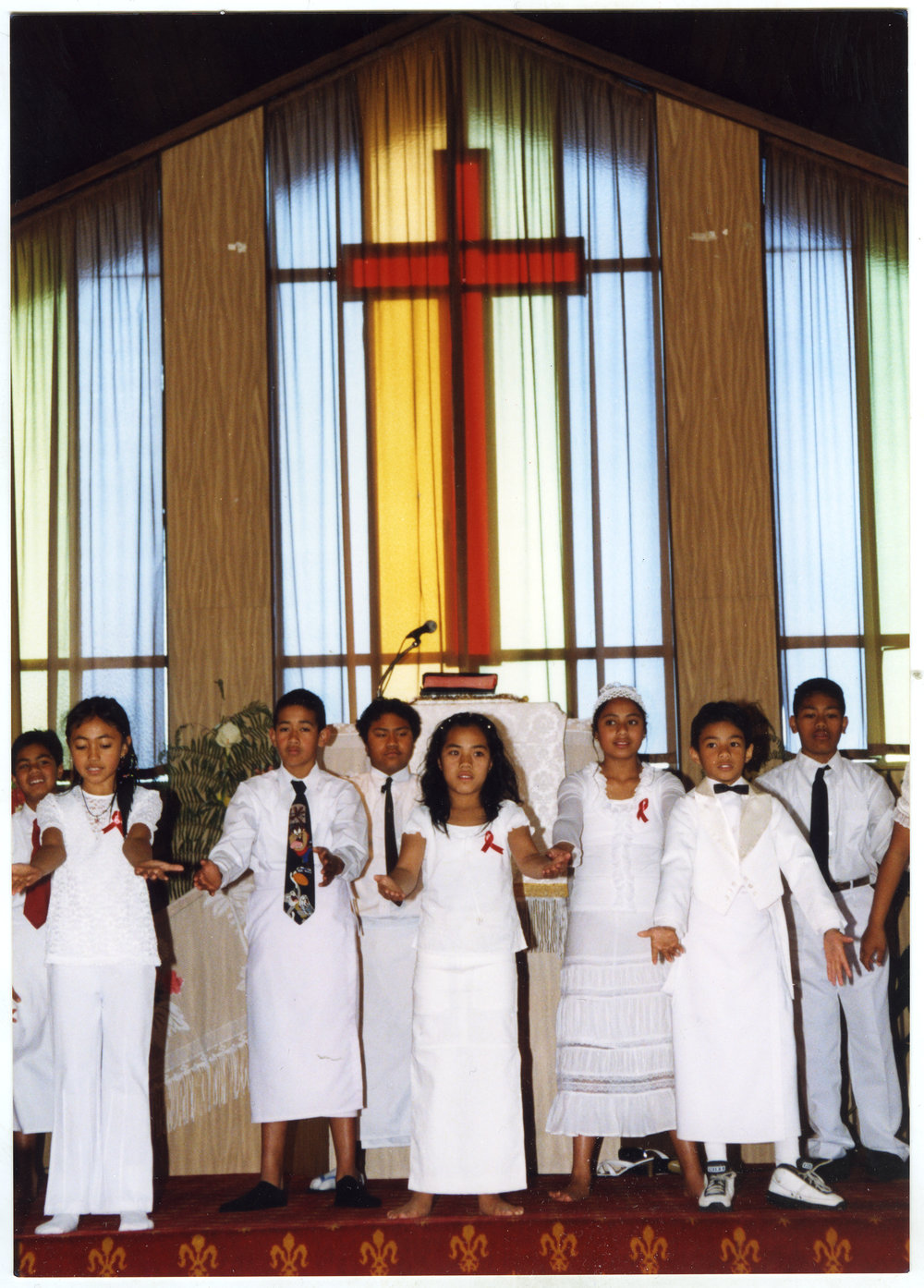 Group of children perform at Glen Eden Pacific Islanders Church during a White Sunday service, 2002