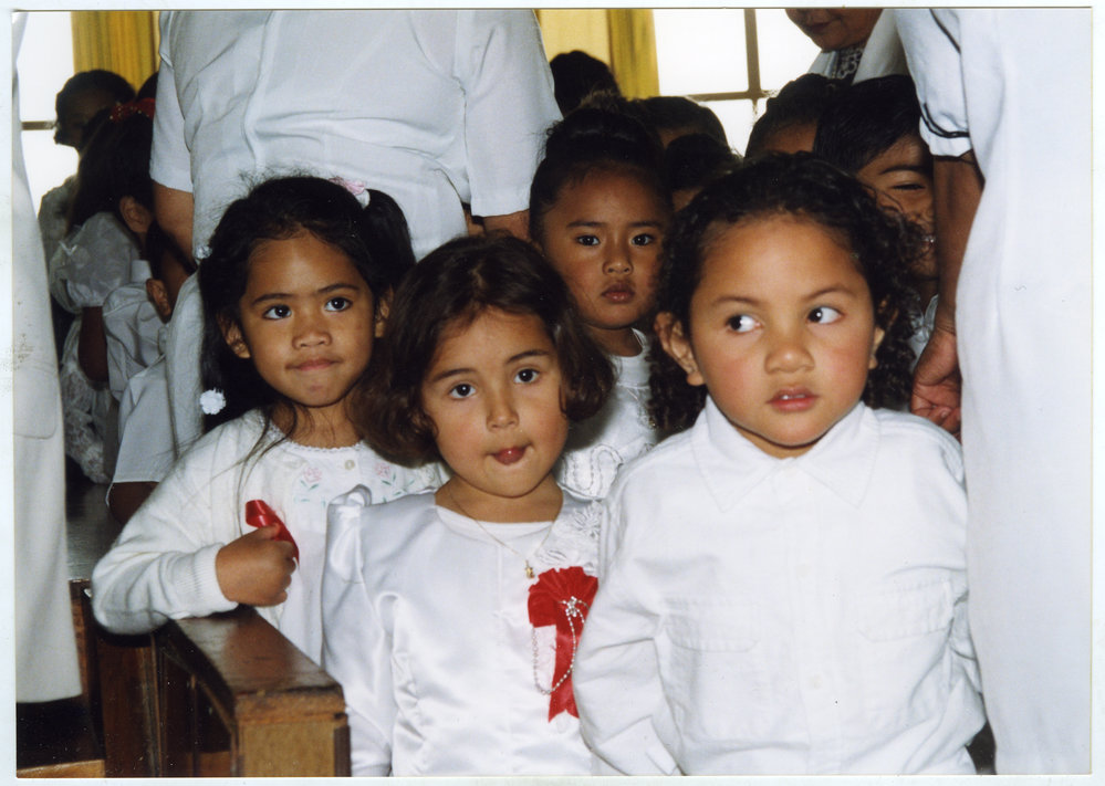 Close-up portrait of young children at the Glen Eden Pacific Islanders Church, White Sunday service, 2002