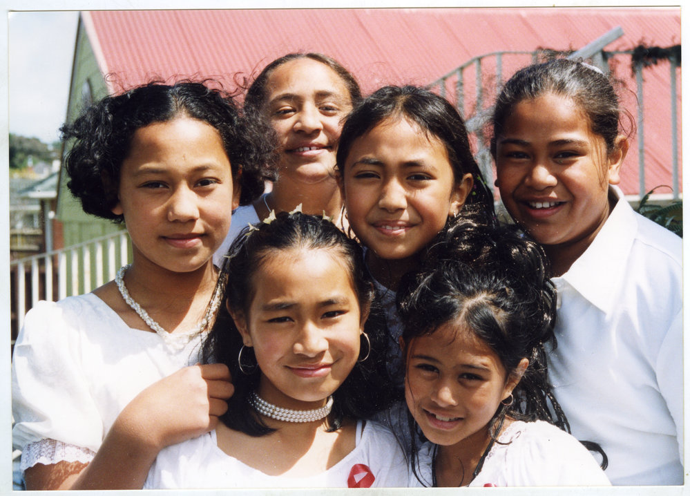 Close-up portrait of young children at the Glen Eden Pacific Islanders Church, White Sunday service, 2002