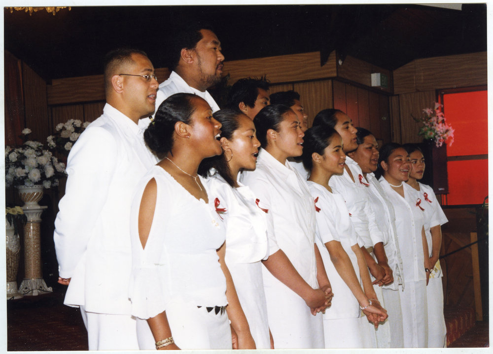 Young women and men sing at the White Sunday service at Glen Eden Pacific Islanders Church, 2002