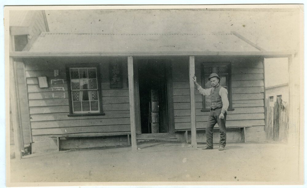 Chau Yau War outside his shop in the Lawrence Chinese Camp