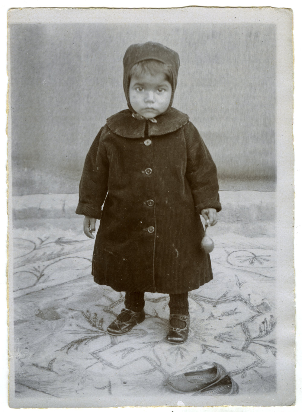 "The baby in his winter clothes"