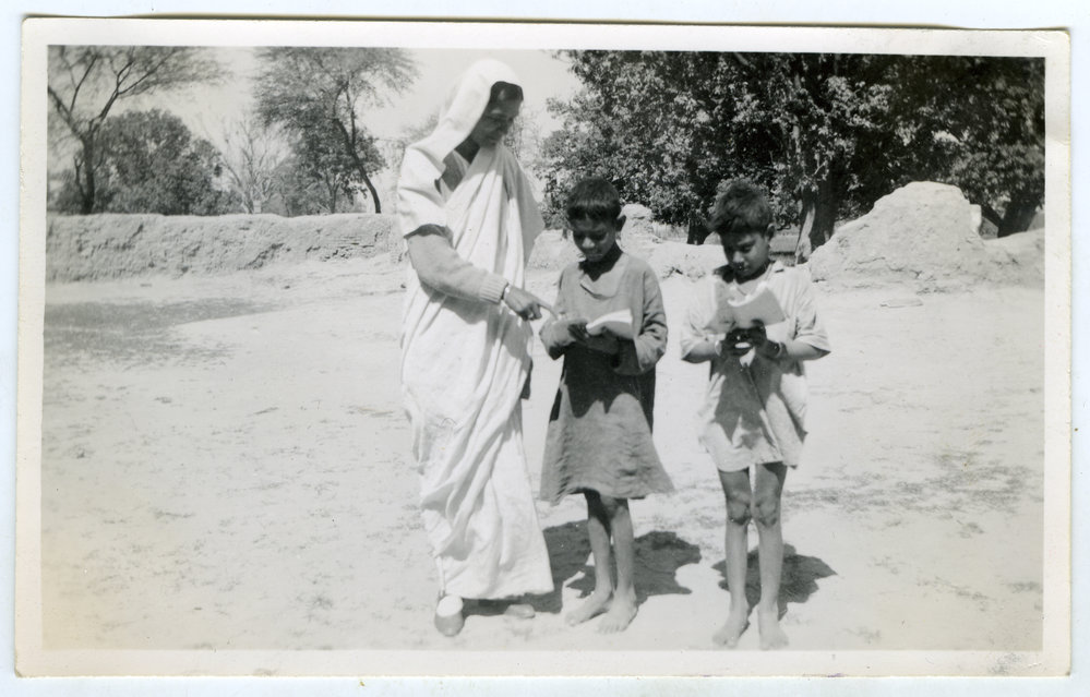 An unidentified woman and two children