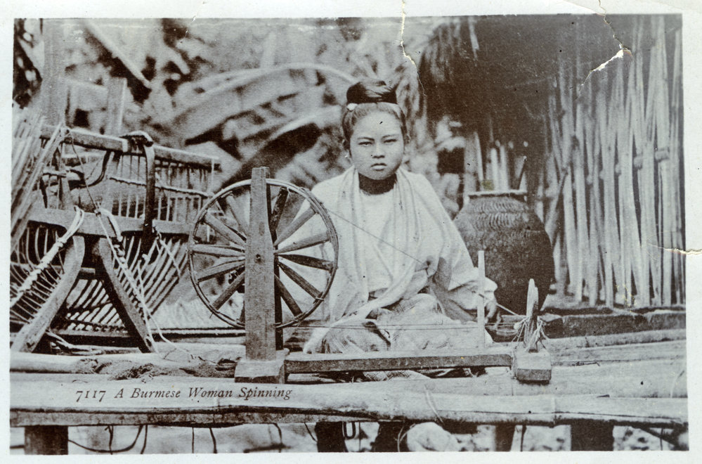 Burmese woman spinning yarn