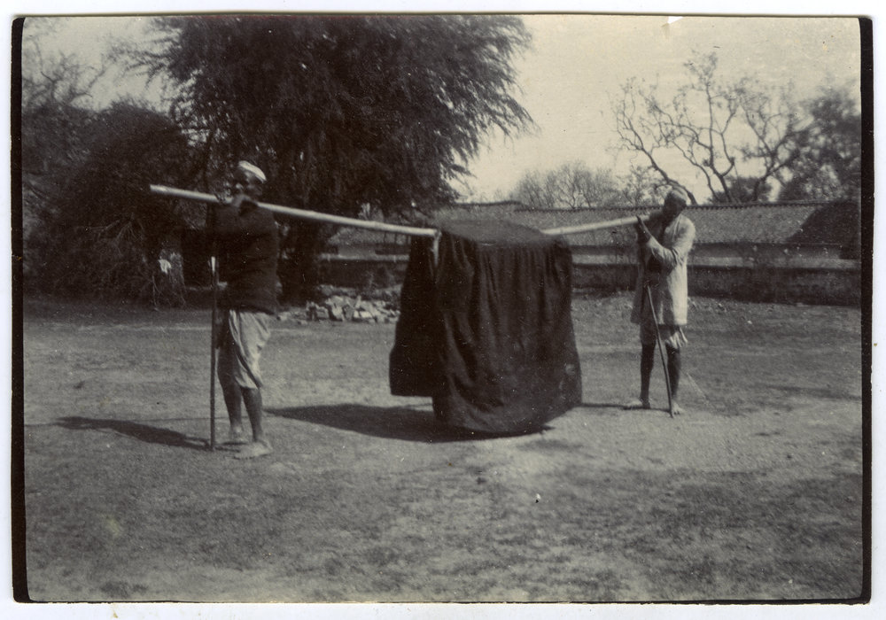 Purdah children being carried to school