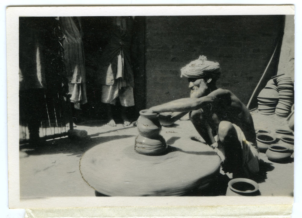 "An Indian potter and his wheel"