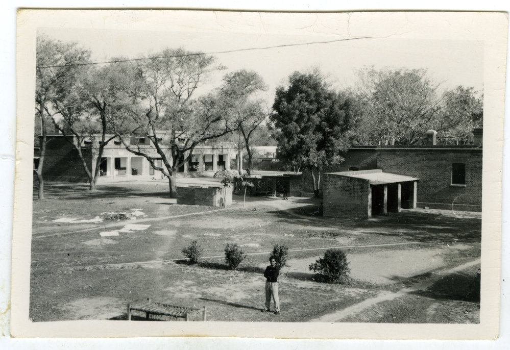 "A). A view of the Hospital compound." 