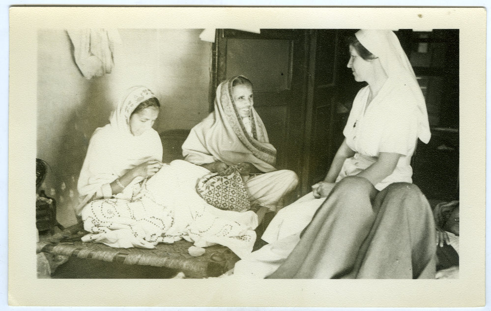 Sister Lorna Aberley chatting to patient's relatives