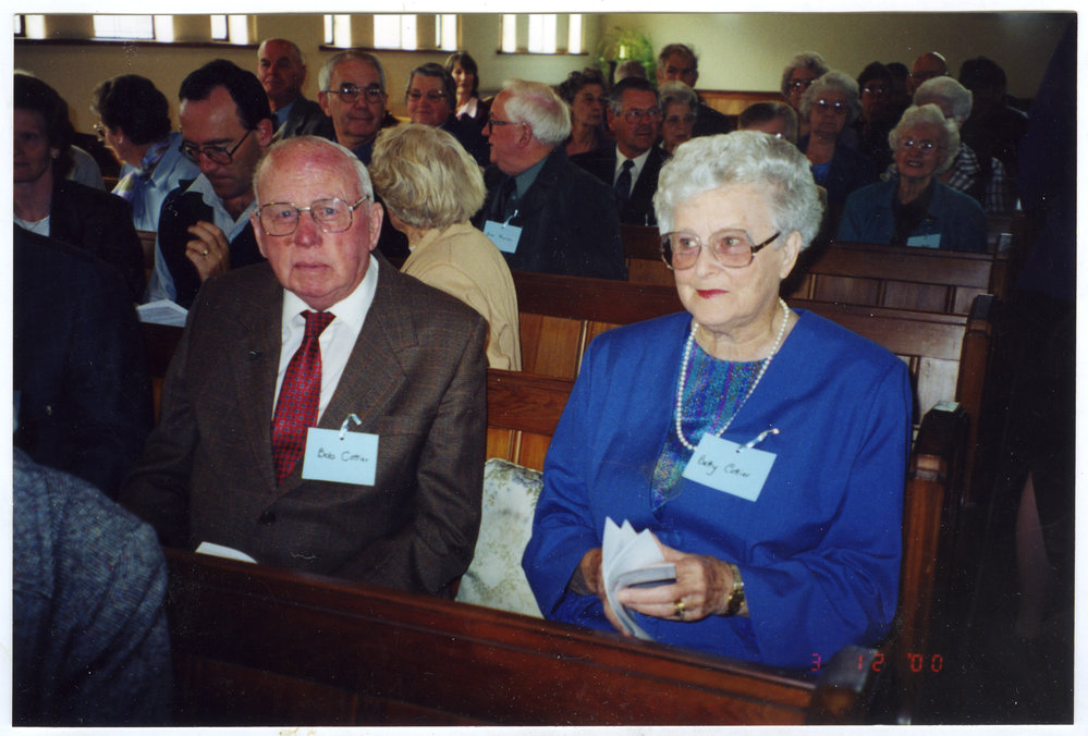 Bob Cotter and Betty Cotter seated in a pew, St .Columba, Christchurch, 2000