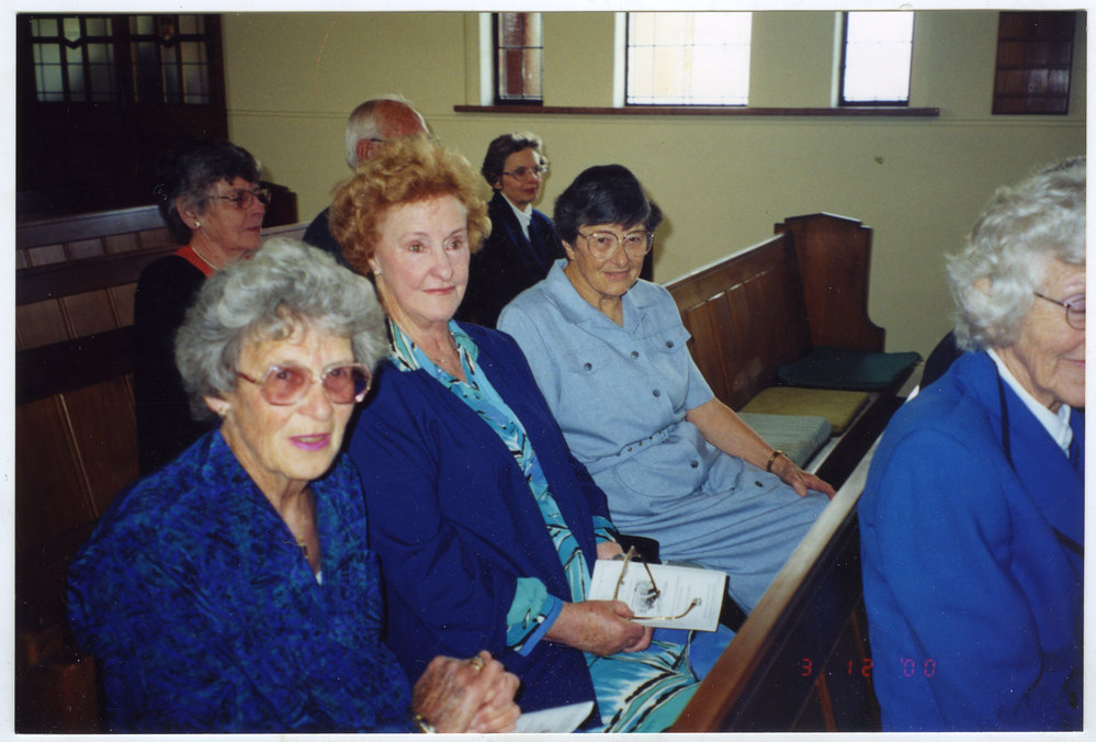 Charlotte Scott, Pat Glass and Helen Cruickshanks, seated in a pew, St. Columba, Christchurch 