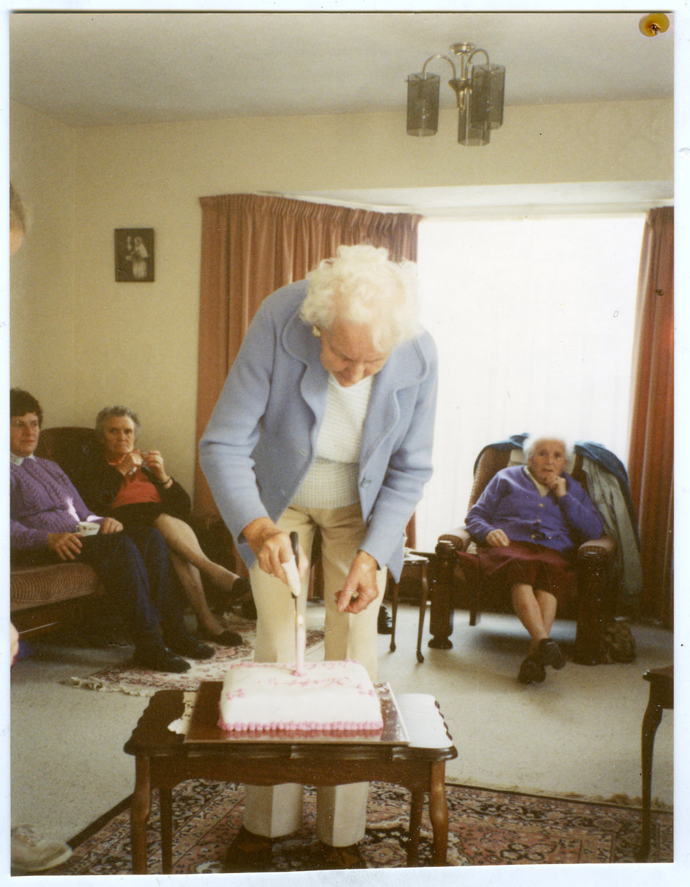 Cutting the cake of the St. Columba Walking Group's first birthday, 1992