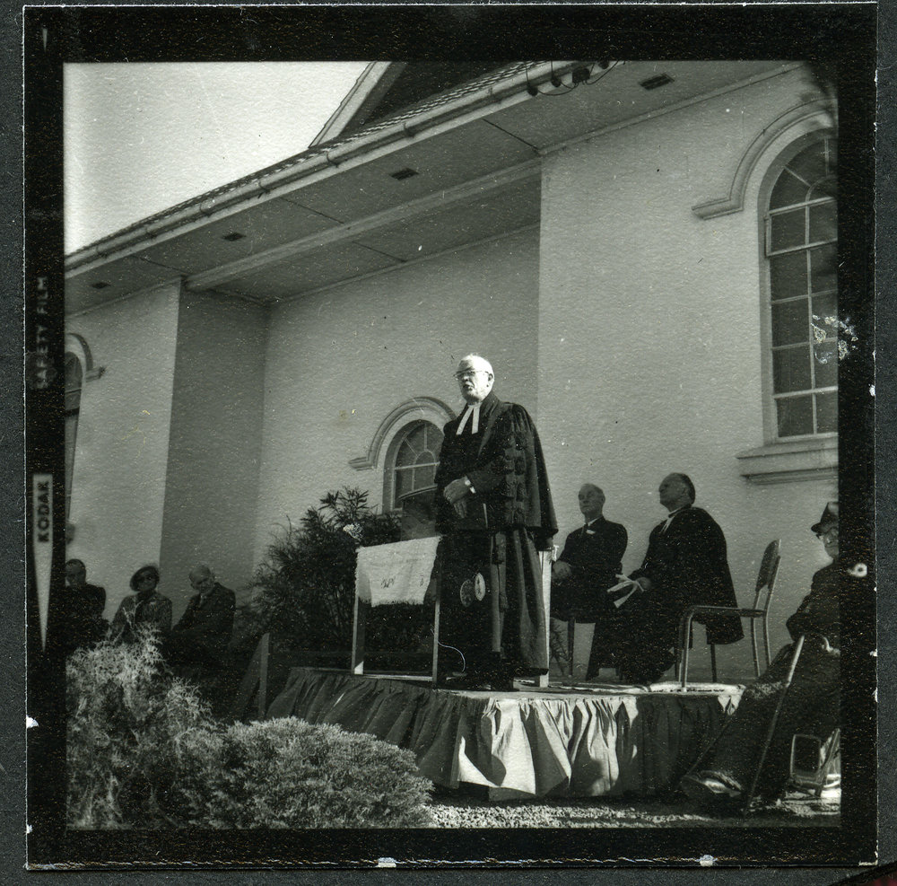 Unidentified man stands giving a speech, John Knox, Rangiora, 1972