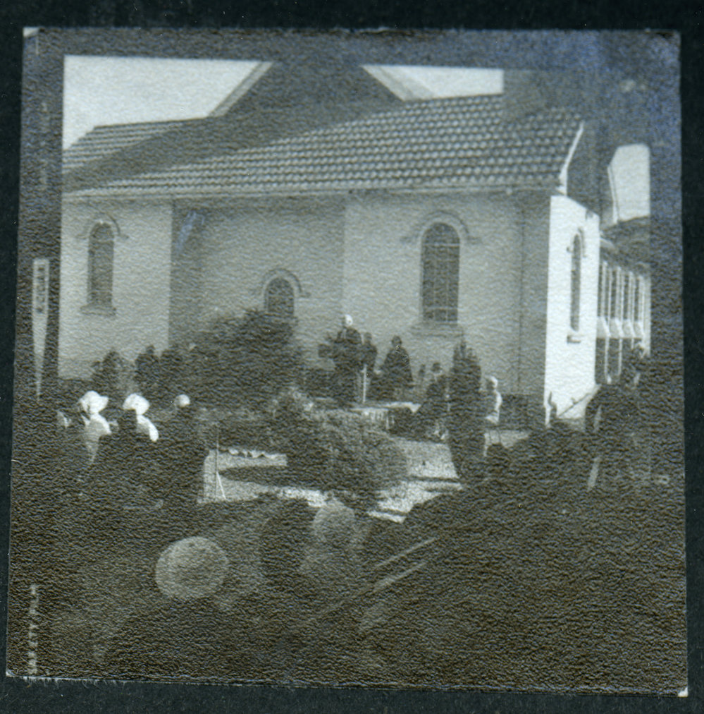 Unidentified man stands giving a speech, John Knox, Rangiora, 1972