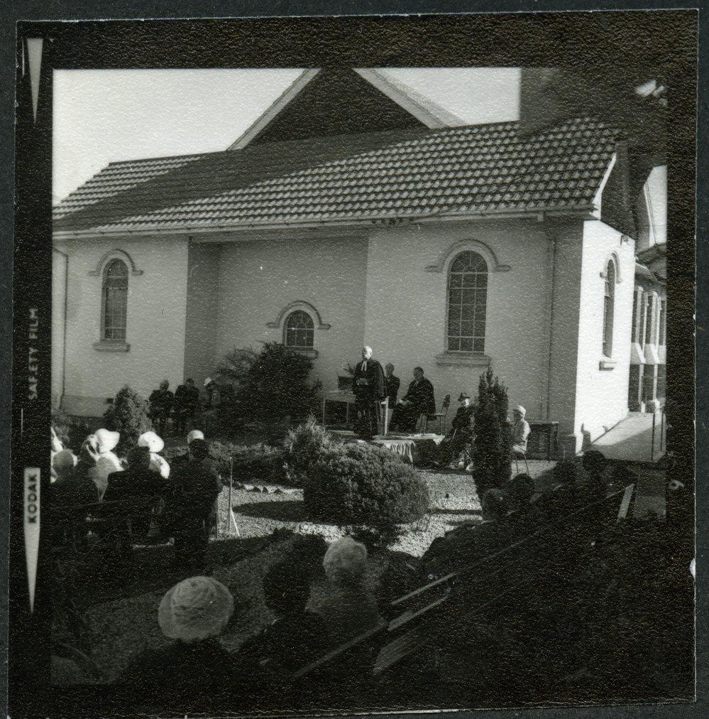Unidentified man stands giving a speech, John Knox, Rangiora, 1972