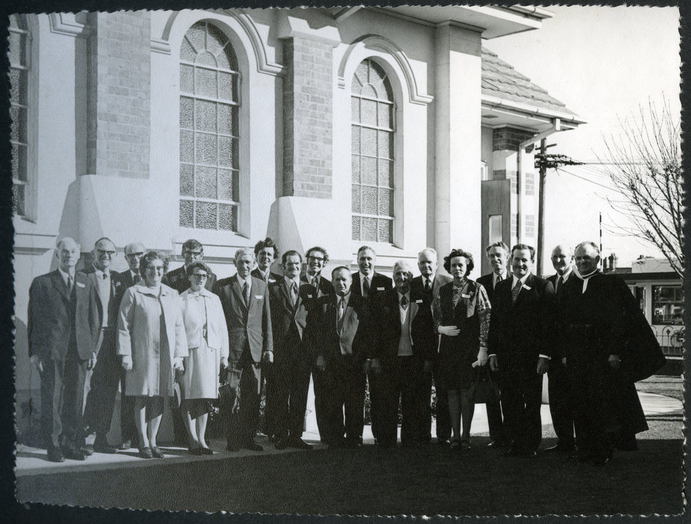 Office-bearers and parishioners standing outside John Knox Church, Rangiora, 1972 