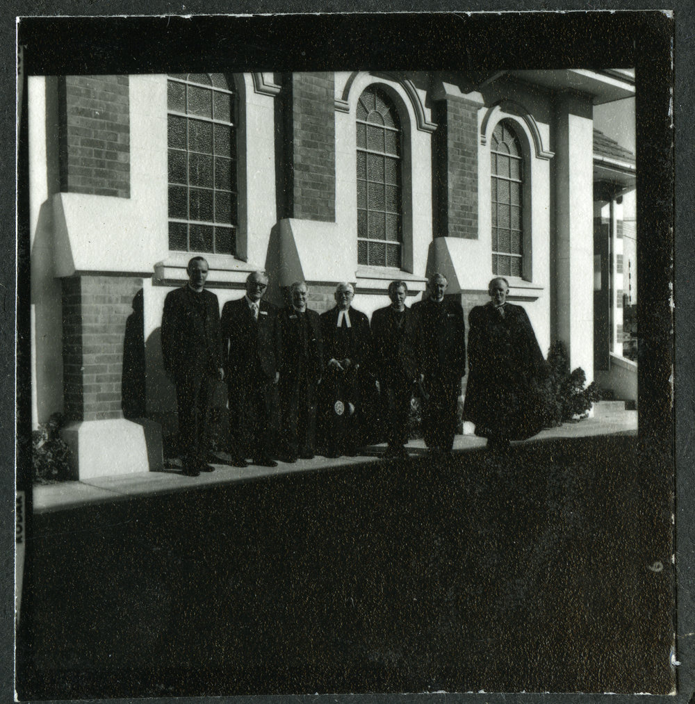 Office-bearers standing outside John Knox Church, Rangiora, 1972