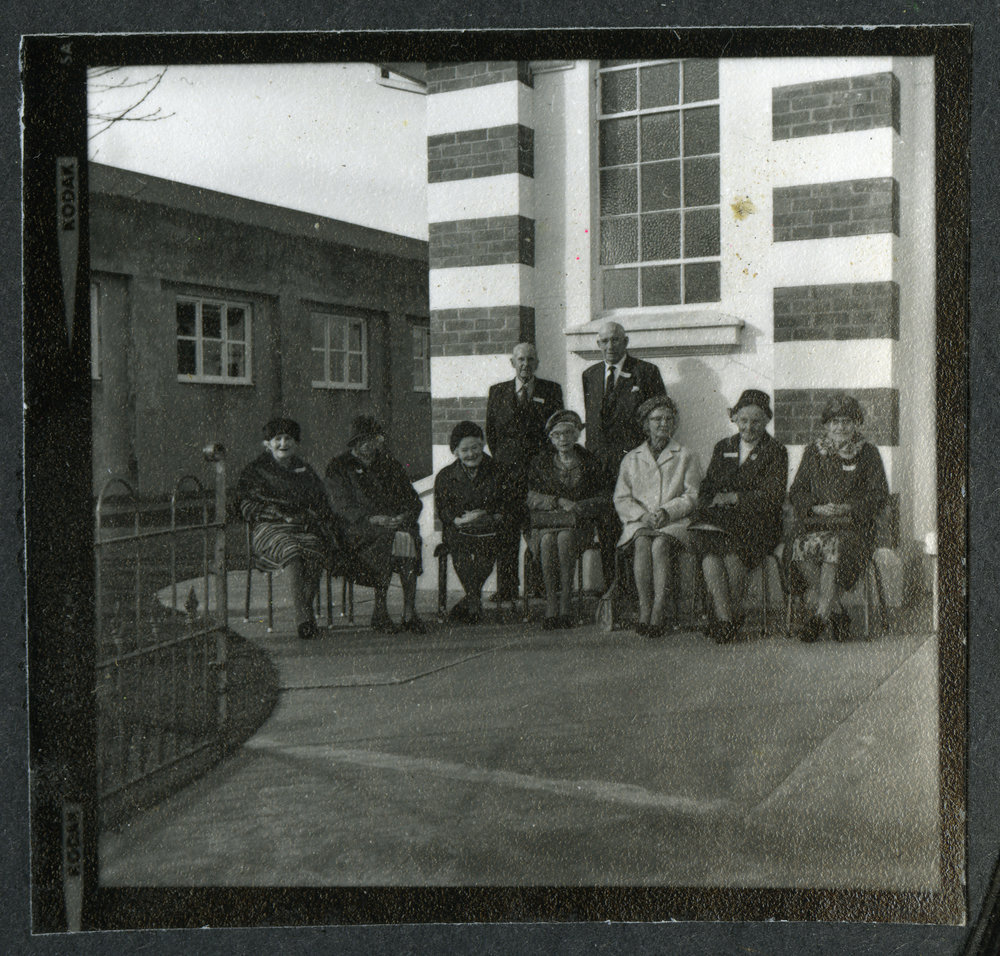 Unidentified women and two unidentified man, celebrating their centenary John Knox Church, Rangiora, 1972