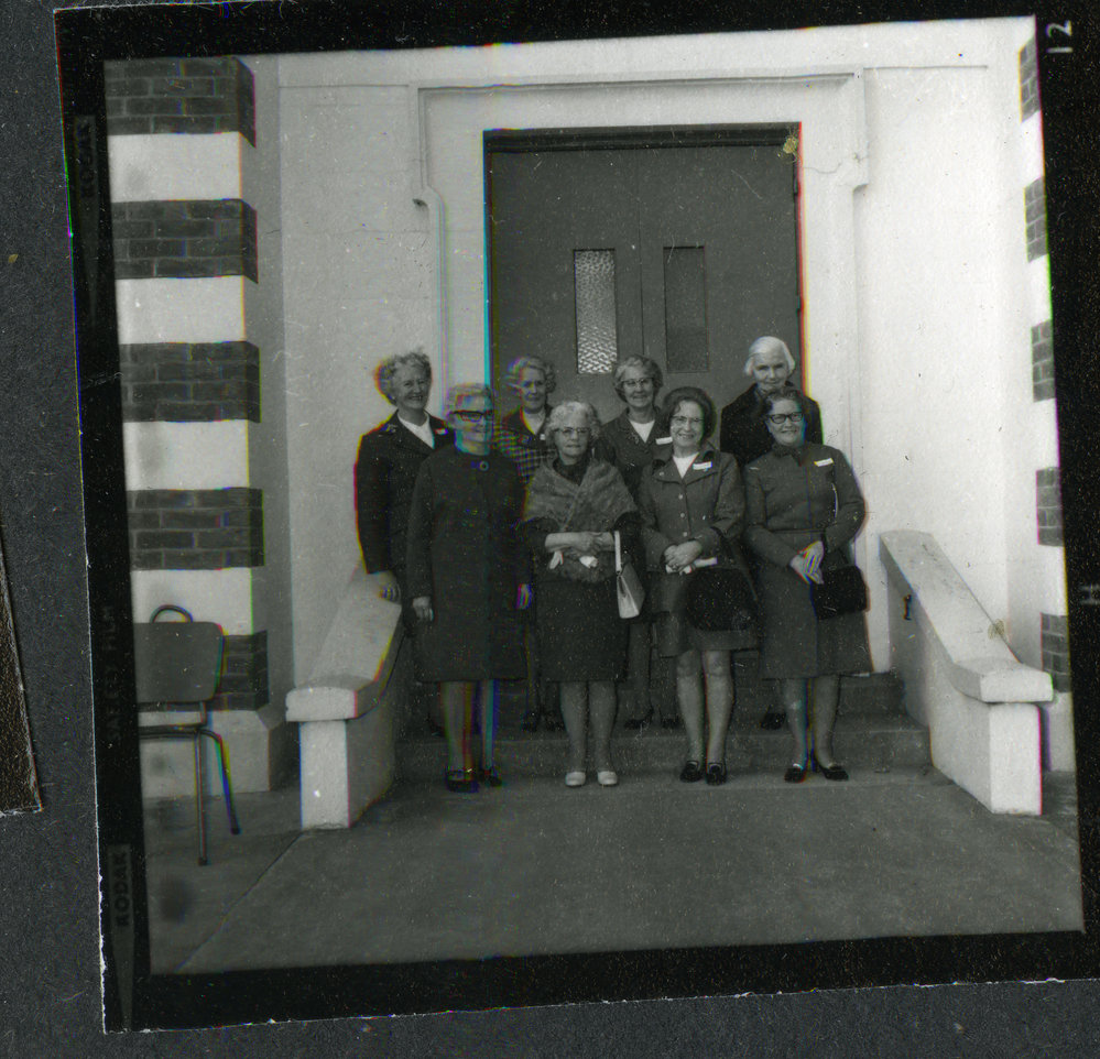 Eight unidentified women stand on the steps of John Knox Church, Rangiora, 1972 
