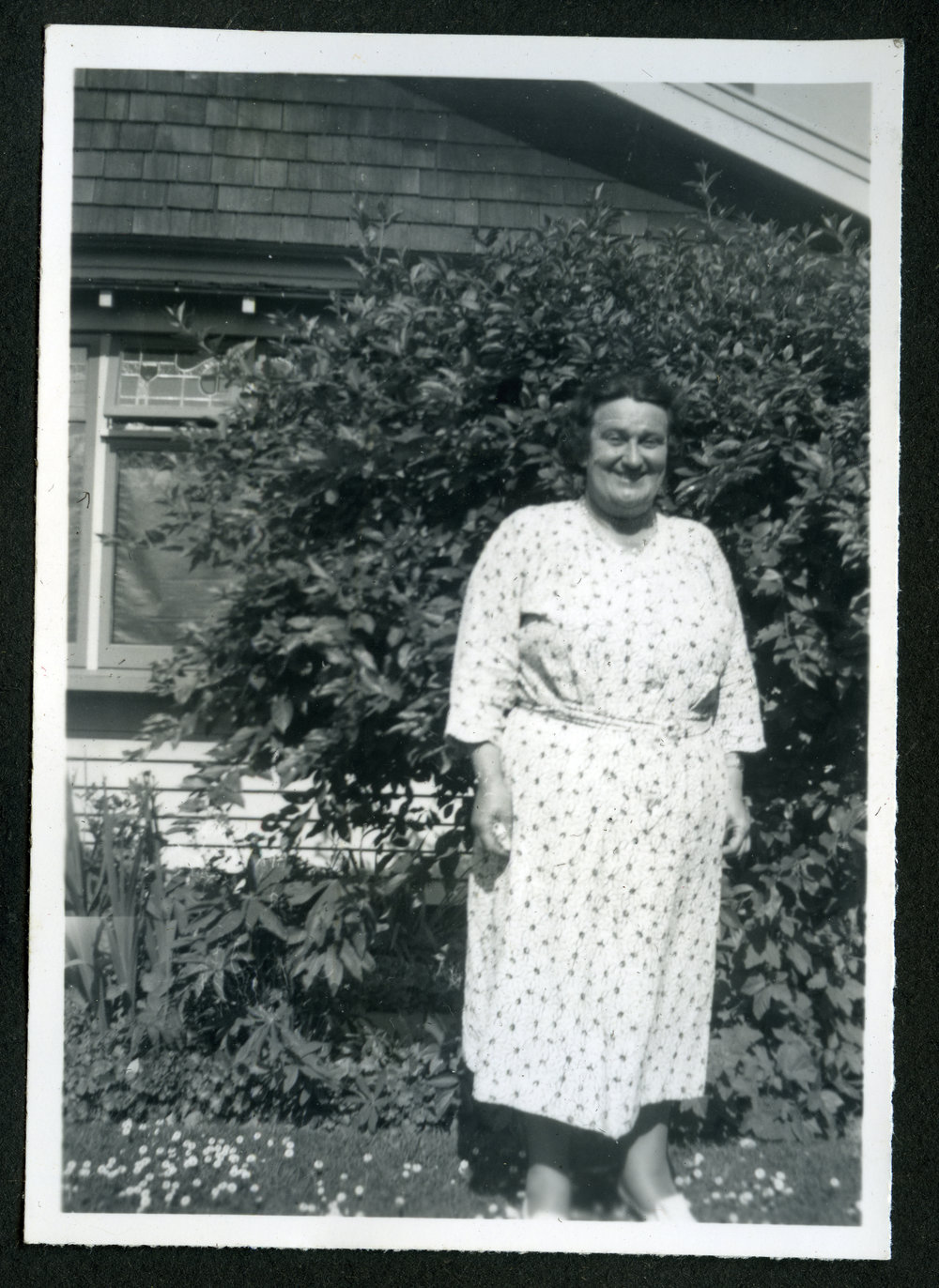 Unidentified woman wearing a light coloured frock 