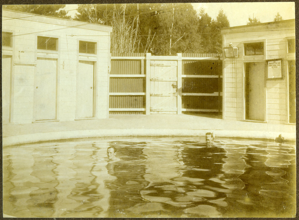 "Hanmer Pools," two unidentified men relaxing in pools