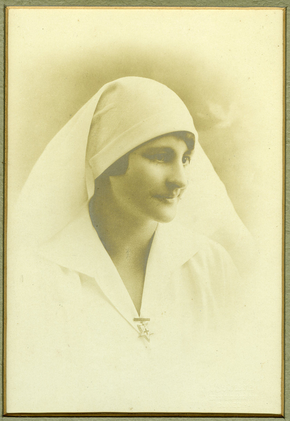 Unidentified female nurse, studio portrait