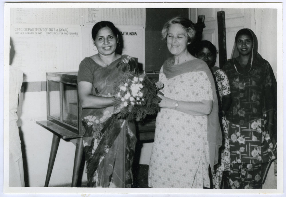 Beryl Howie receiving flowers from a colleague at the Christian Medical College and Hospital