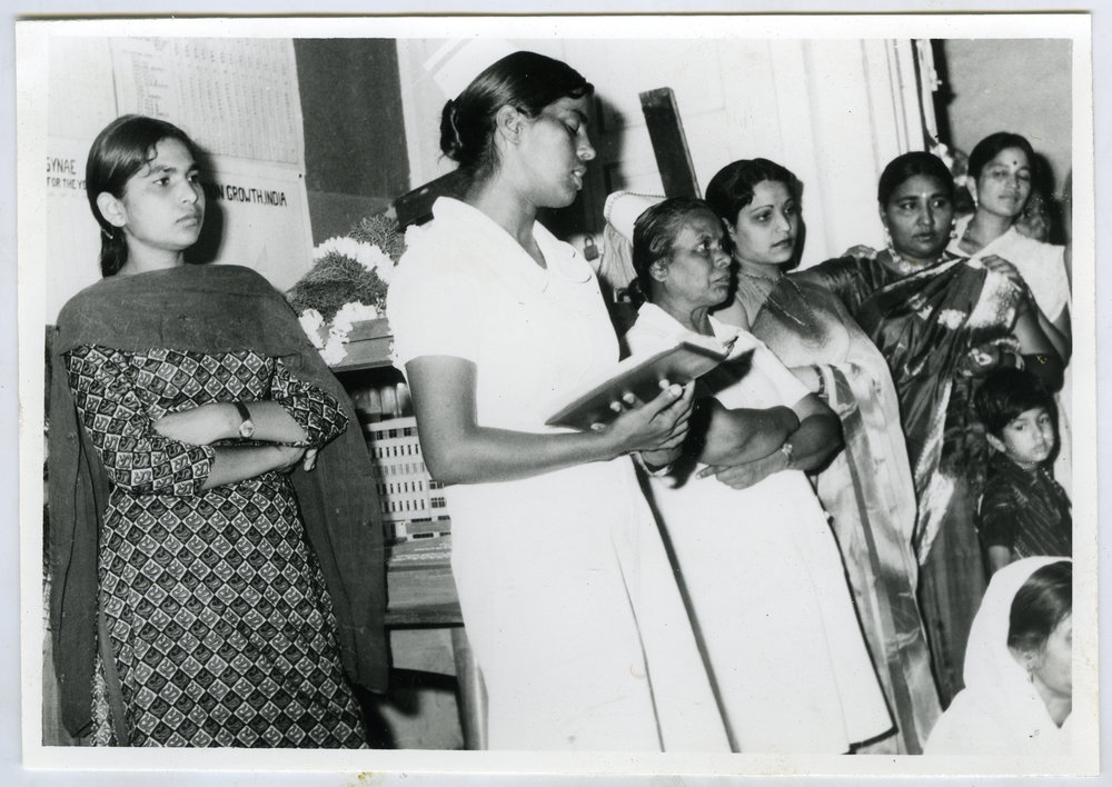 An unidentified Indian women speaks, while other Indian women look on, Christian Medical College and Hospital, Ludhiana