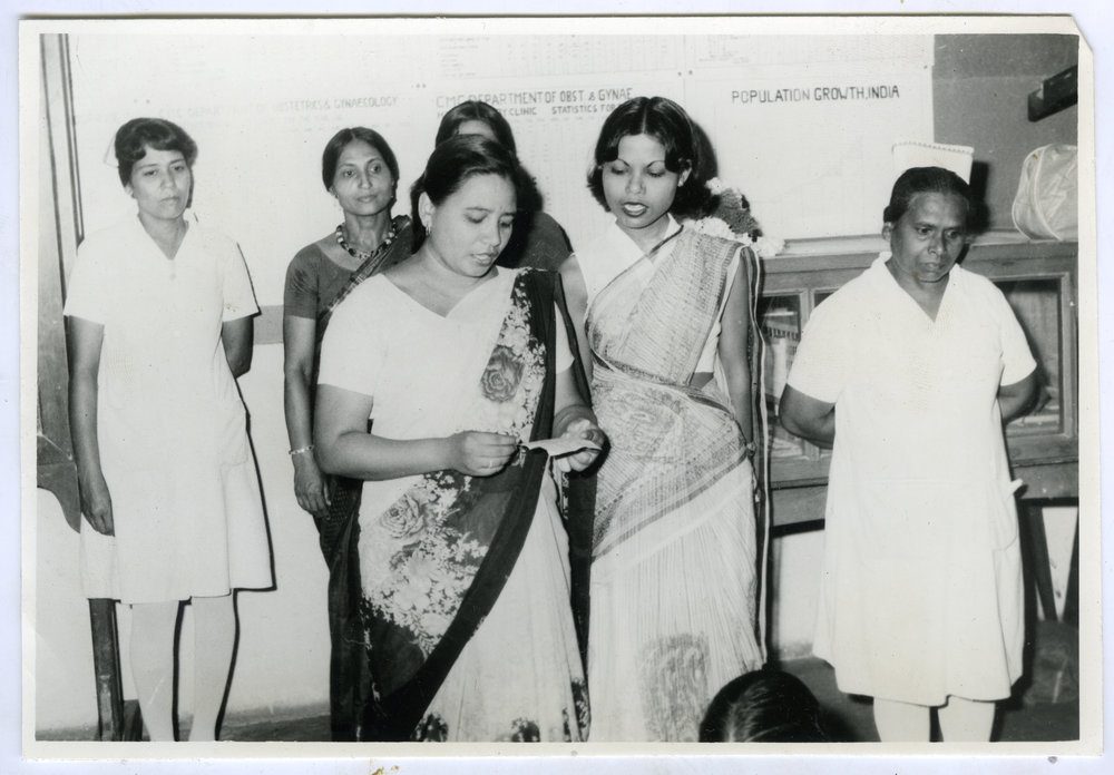 Two unidentified Indian women speak or sing, Christian Medical College and Hospital, Ludhiana