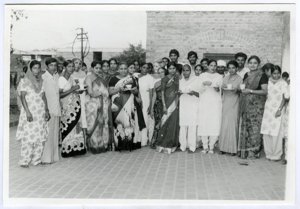 An unidentified group of Indian women, some holding tea cups and saucers, Christian Medical College and Hospital, Ludhiana
